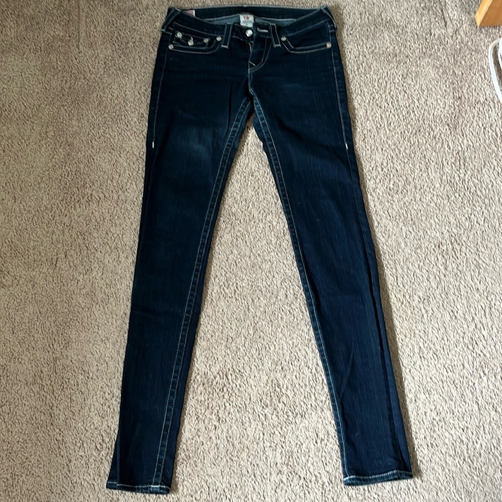 True Religion size 27 sunny jean with jewel button detailing.